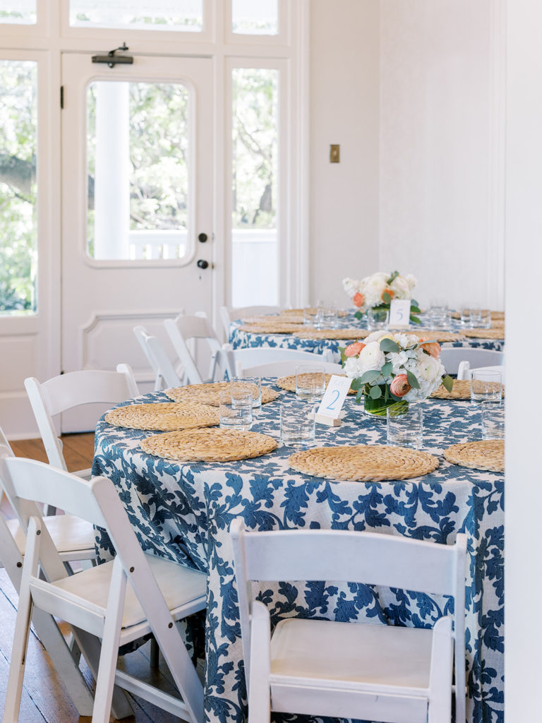 Blue tablecloth with woven placemats
