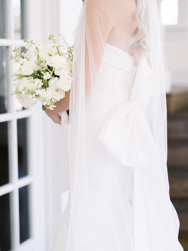 White wedding flowers with white wedding dress